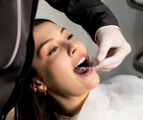 lady receiving partial dentures
